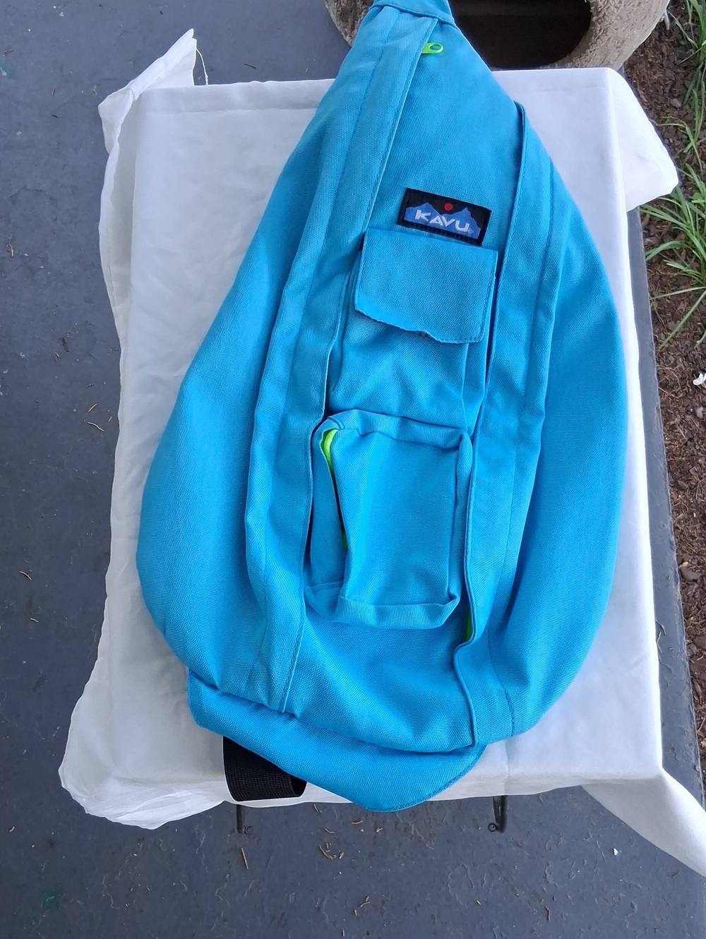 Kavu Bright Teal Sling Bag with Neon Accents
